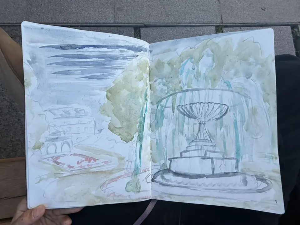 A watercolor sketch of a Warsaw fountain