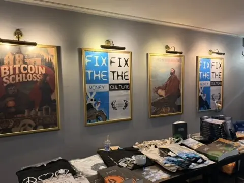 The festival posters displayed in a gallery