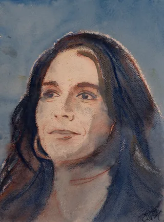 A woman with long dark hair against a blue background